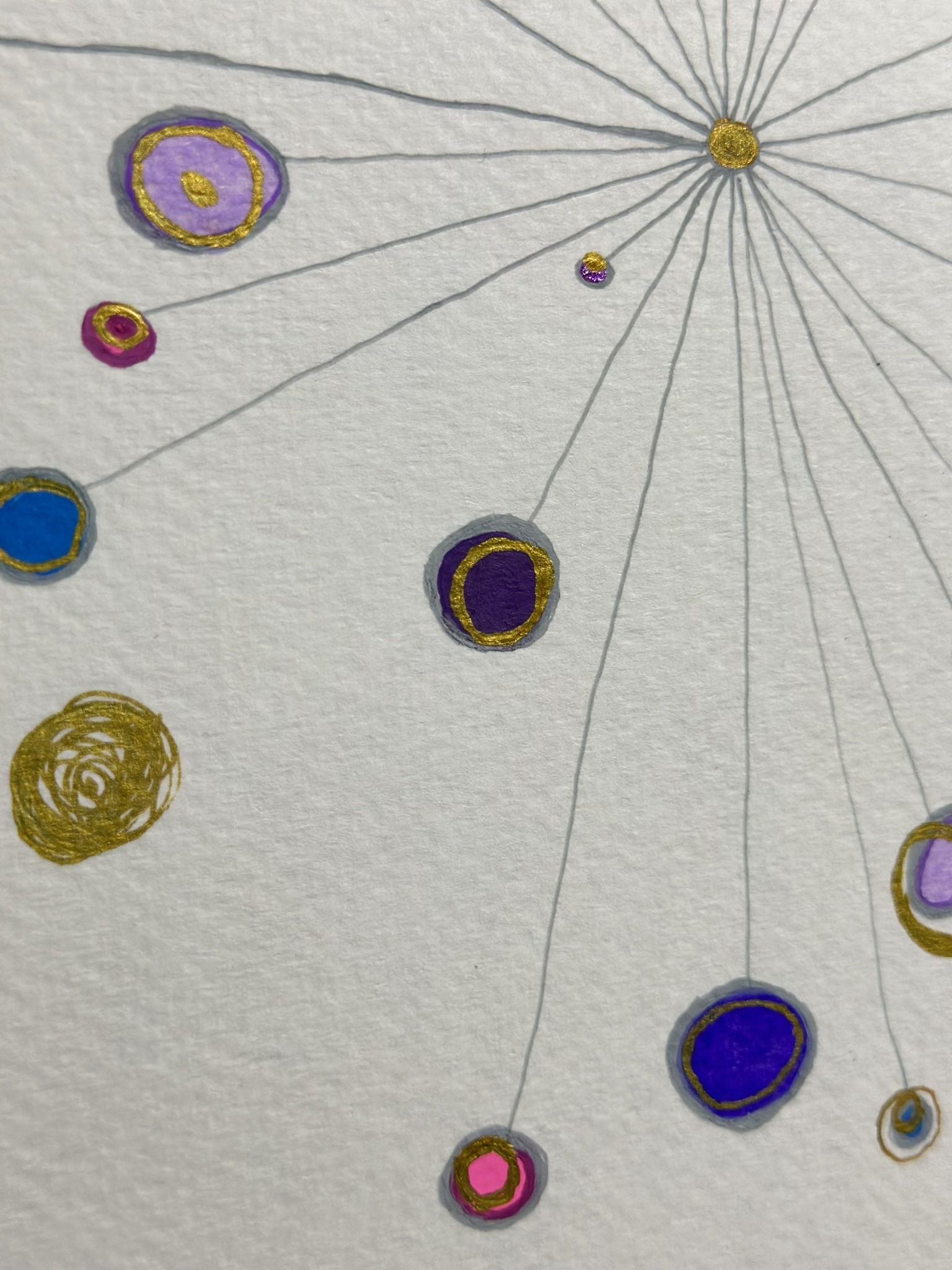 A gel pen drawing of colorful circles connected by fine radiating lines